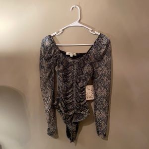 Snakeskin long sleeve bodysuit